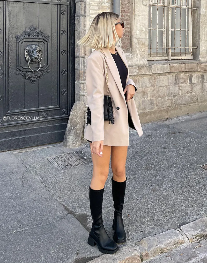 Bottes noires à bout carré et talon épais à semelle crantée