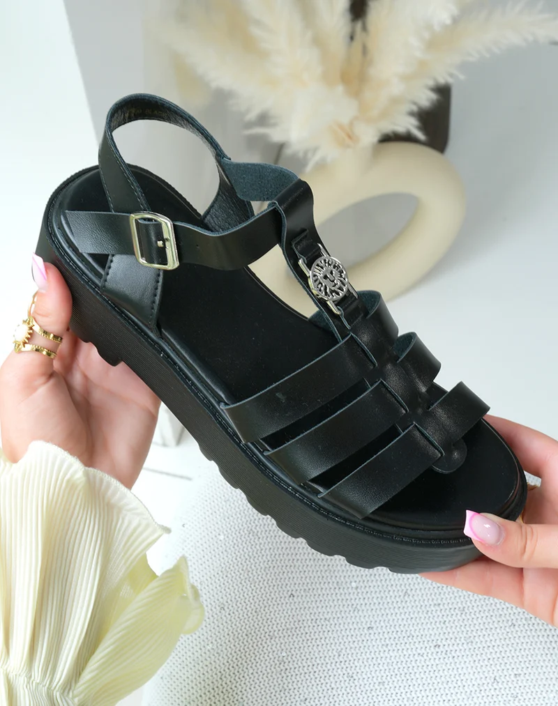 Sandales femme noires à multiples brides avec plateforme crantée et bijou argenté