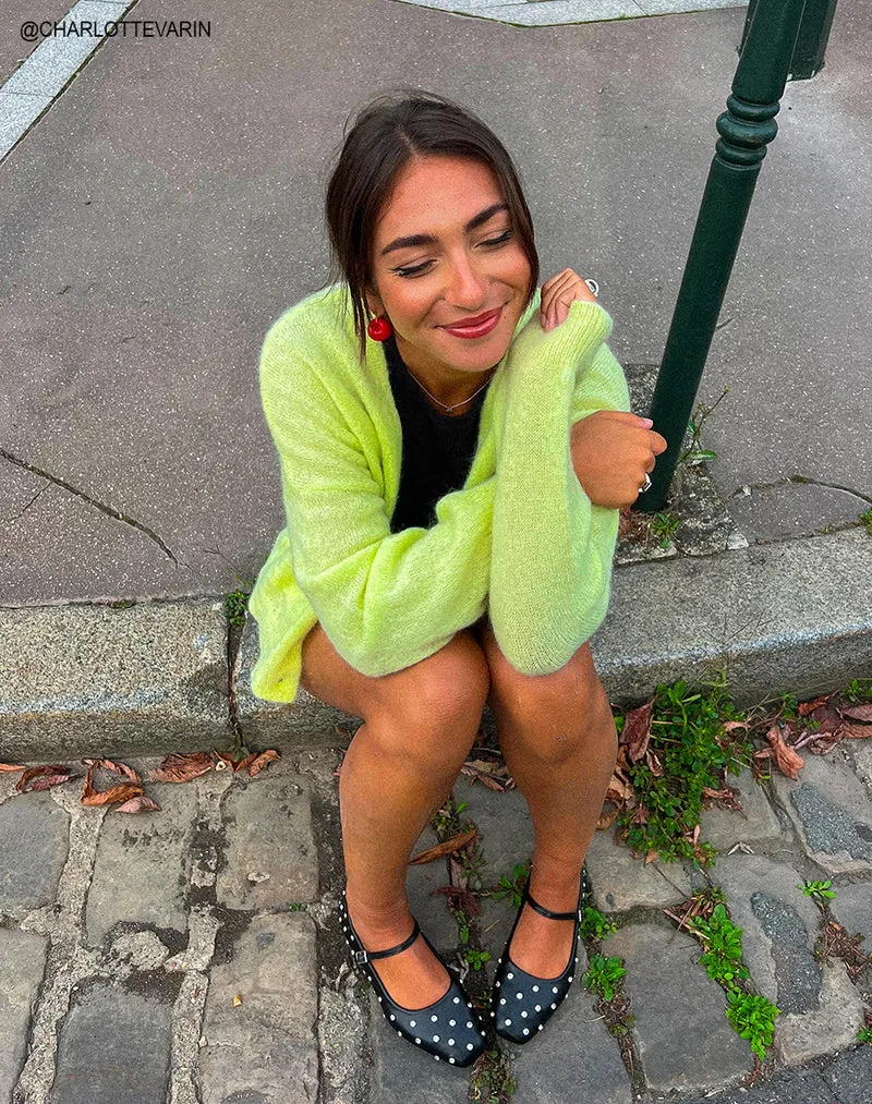 Ballerines noires ornées de clous strassés pour une touche d'éclat