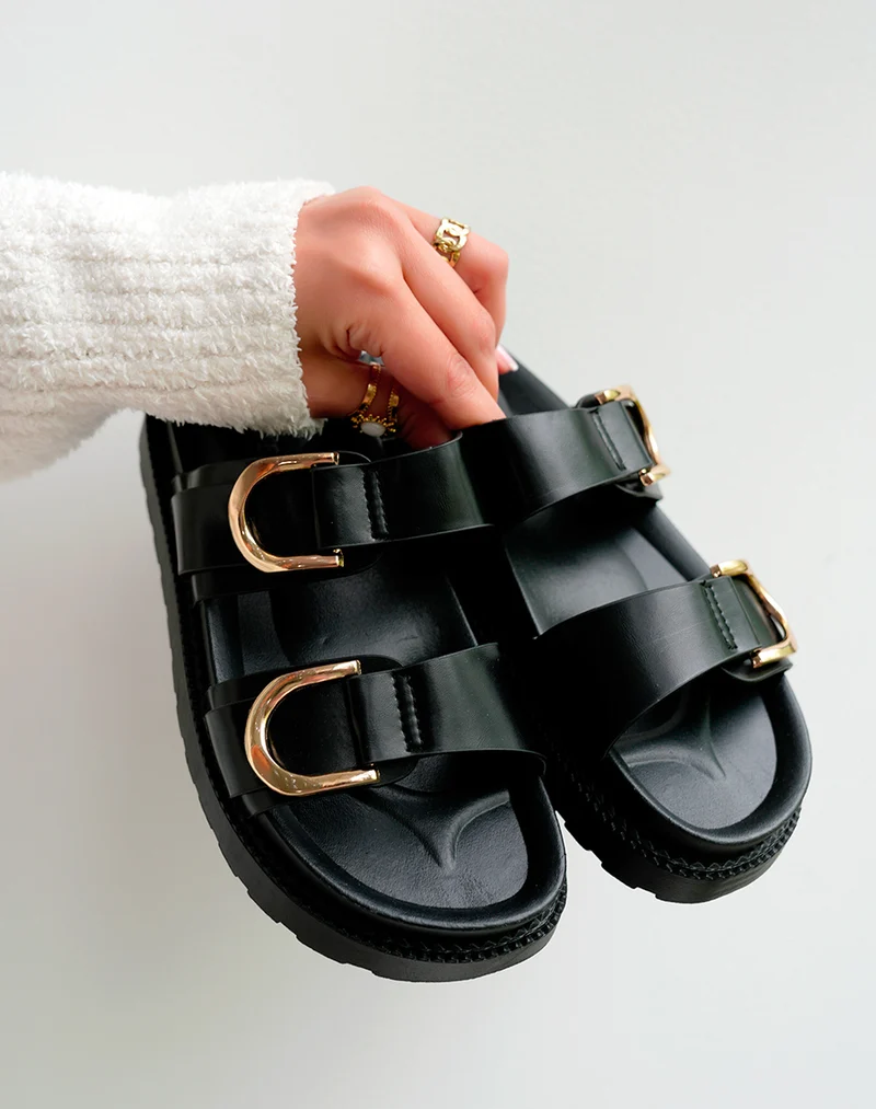 Mules Noires Classiques avec Double Sangle et Boucles Dorées – Un Essentiel Revisité