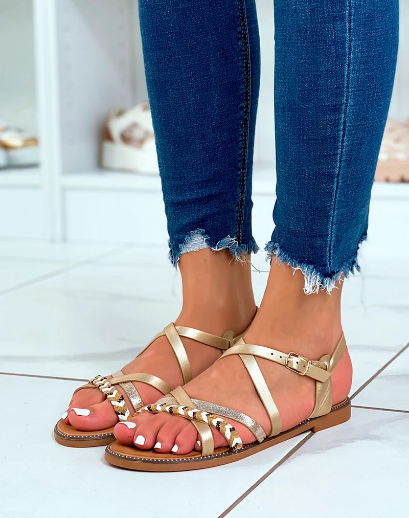 Nu-pieds dorés à multiples brides à motifs