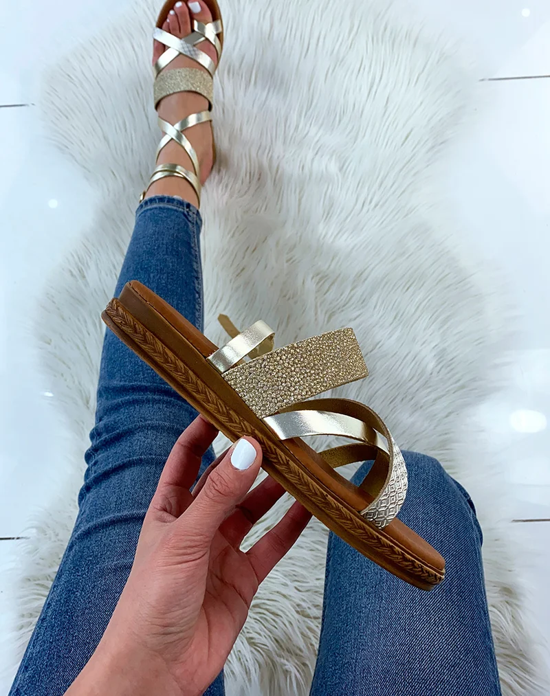 Nu-pieds dorés en cuir à brides entrecroisées