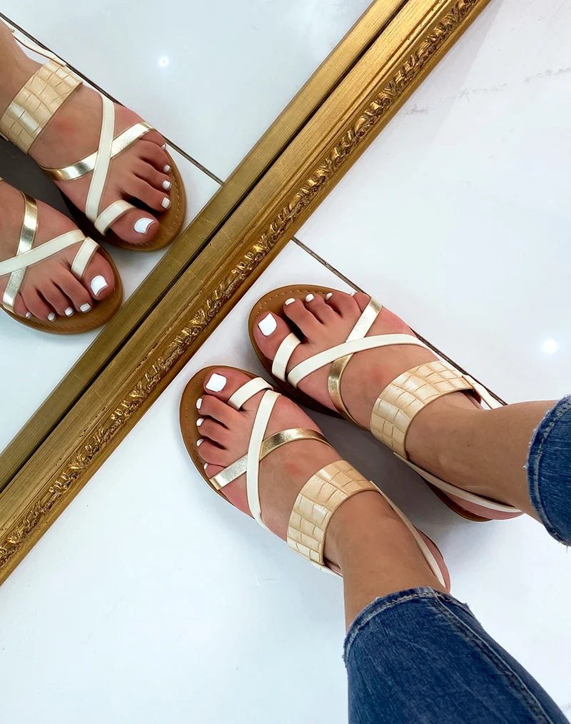 Nu-pieds beiges à brides entrecroisées