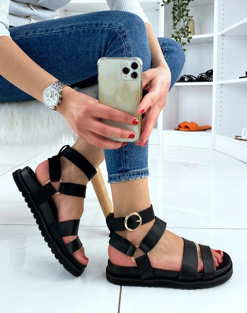 Sandales noires à multiples brides et boucles dorées