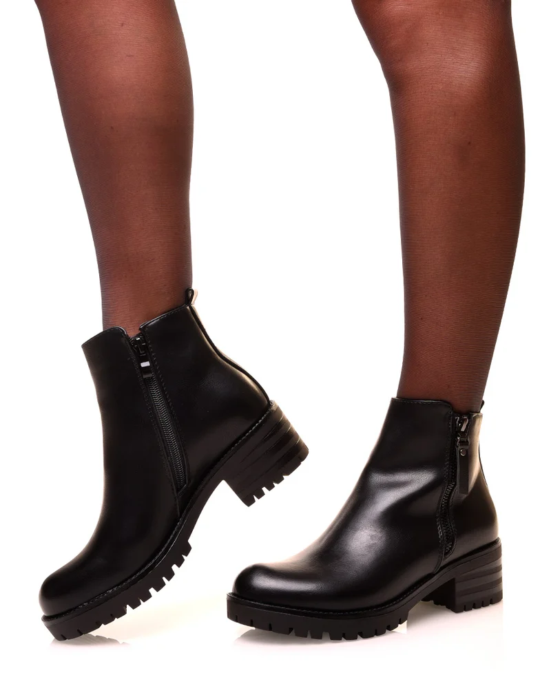 Bottines noires à fermeture décorative et semelle crantée