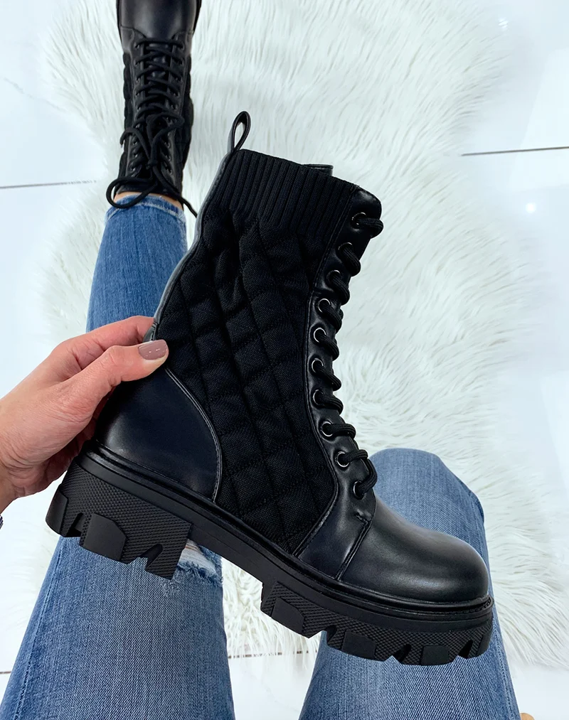 Bottines hautes noires matelassés à semelle crantée