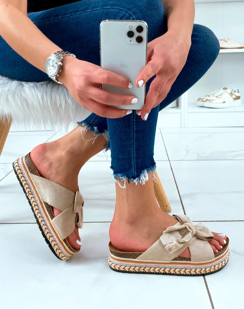 Mules à plateforme en suédine beige à gros noeud