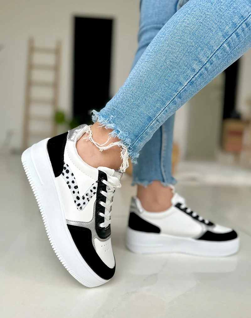 Baskets noires et blanches avec motifs dalmatien et détails argentés