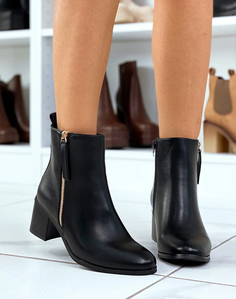Bottines noires à zip doré et petit talon