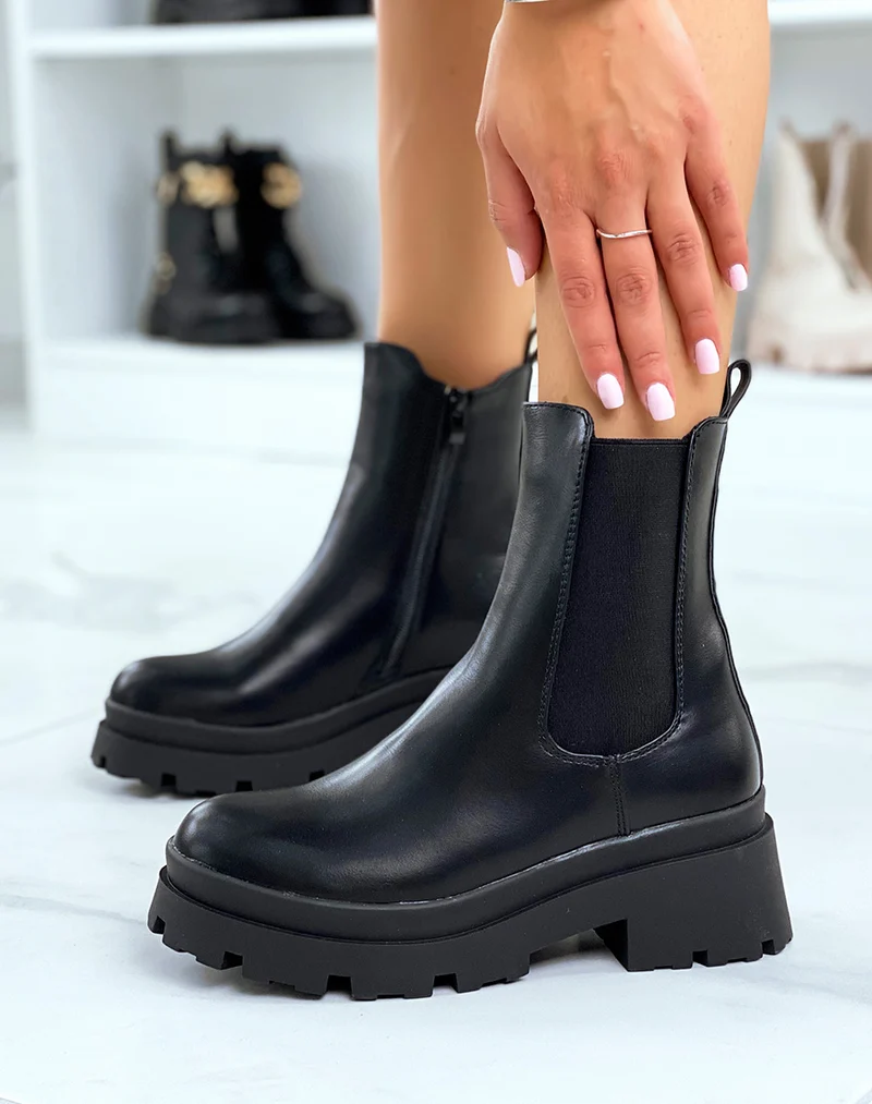 Chelsea boots noires montantes à talon et semelle crantée