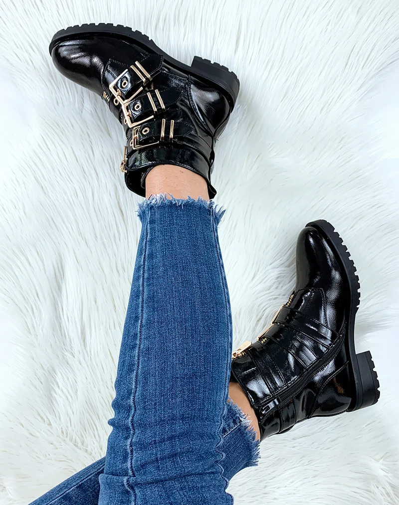 Bottines montantes vernies noires à boucles dorés