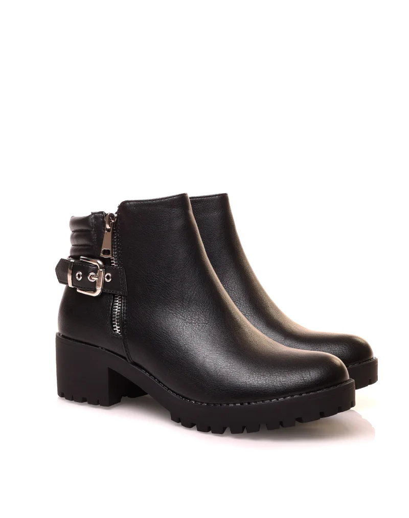 Bottines noires à talons et à zip décoratif