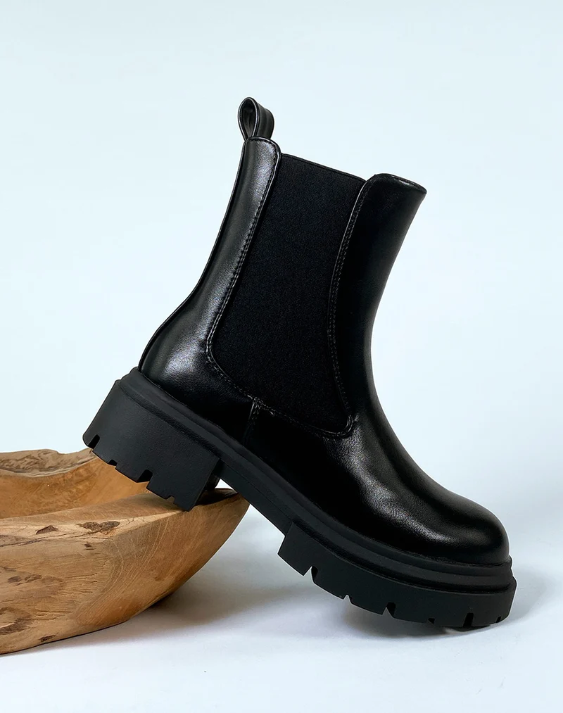 Bottines noires style chelsea boots à élastique et fermeture éclaire