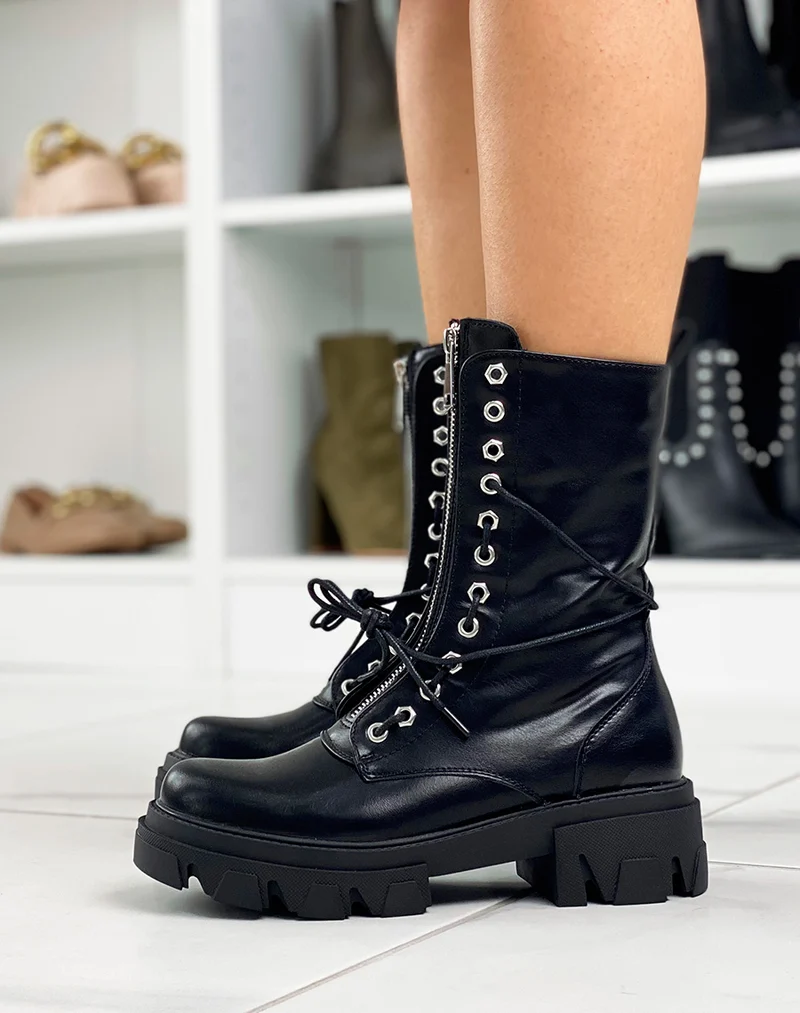 Bottines hautes noires à zip argentée