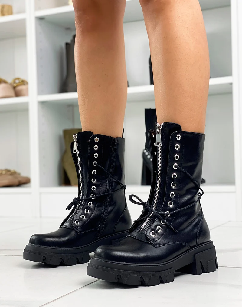Bottines hautes noires à zip argentée