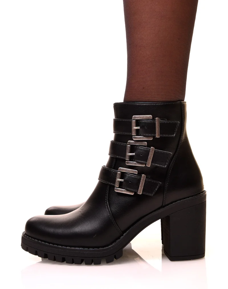 Bottines noires à talons et à sangles