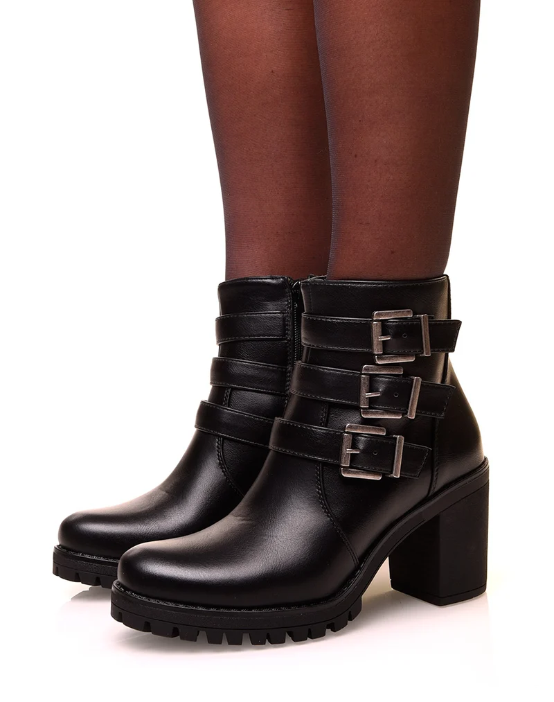 Bottines noires à talons et à sangles