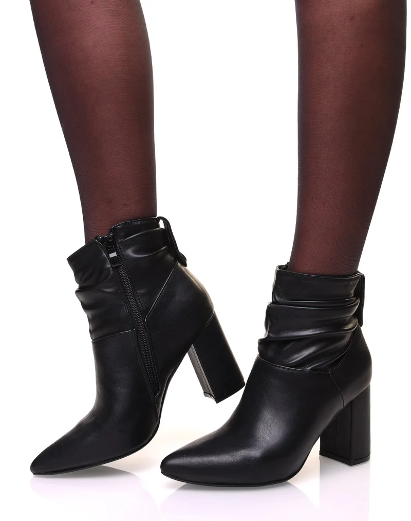 Bottines noires à talons carrés et bouts pointus effet plissé