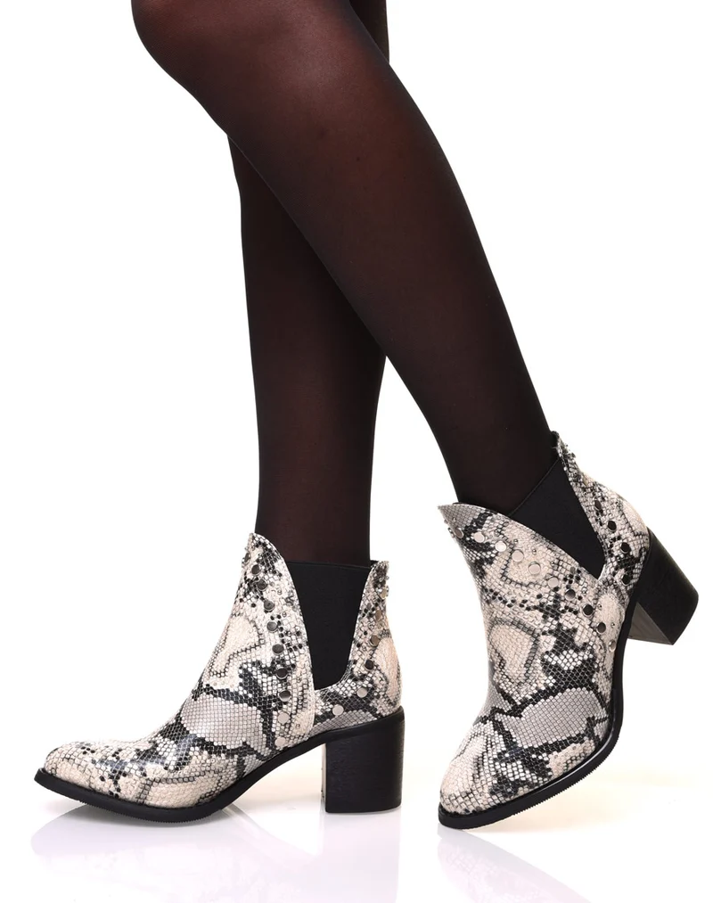 Bottines à talon aux motifs serpent et détails cloutés