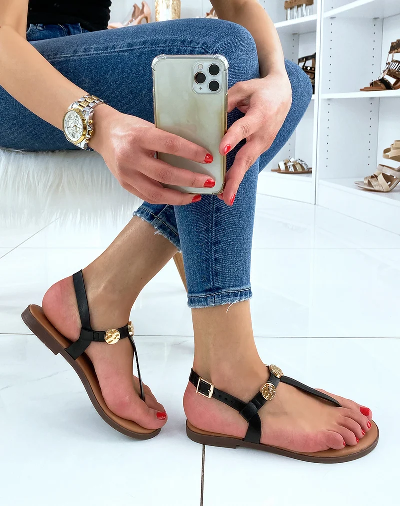 Nu-pieds à entredoigt noirs à détail doré