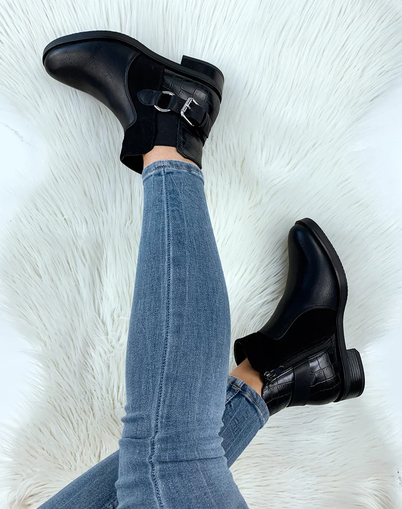 Bottines noires à boucle et lanière