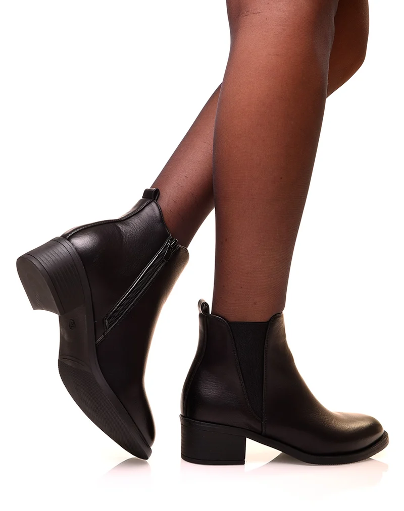 Bottines noires bi-matières à semelles crantées