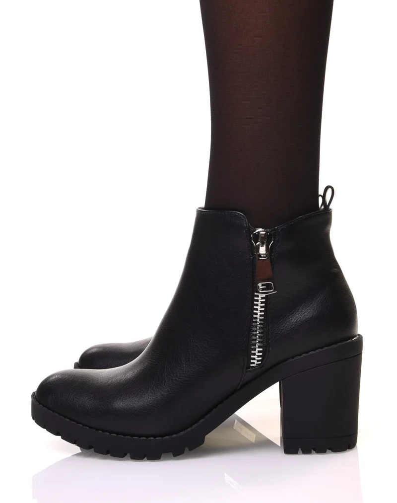Bottines noires à talons et semelle crantée