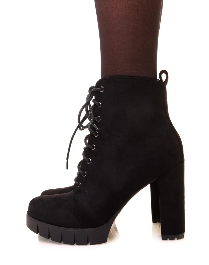 Bottines noires en suédine à talon et plateforme épaisse
