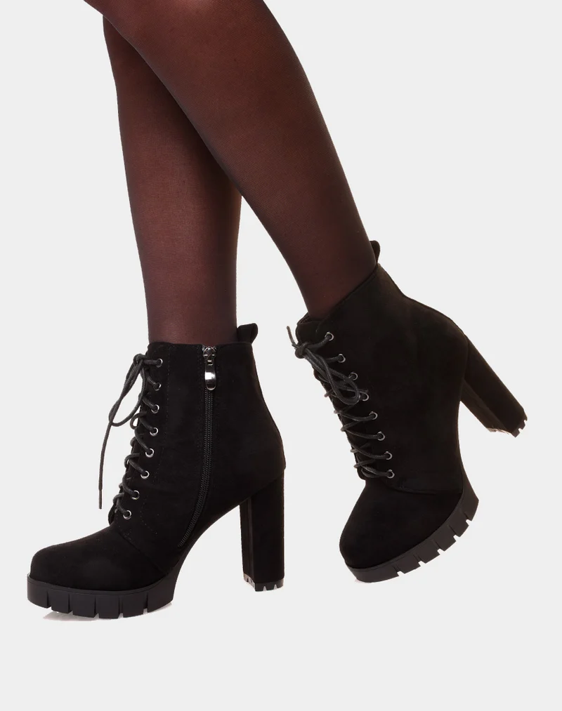 Bottines noires en suédine à talon et plateforme épaisse