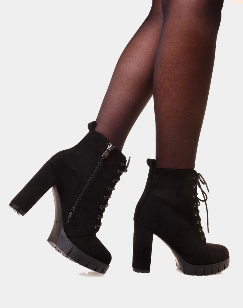 Bottines noires en suédine à talon et plateforme épaisse