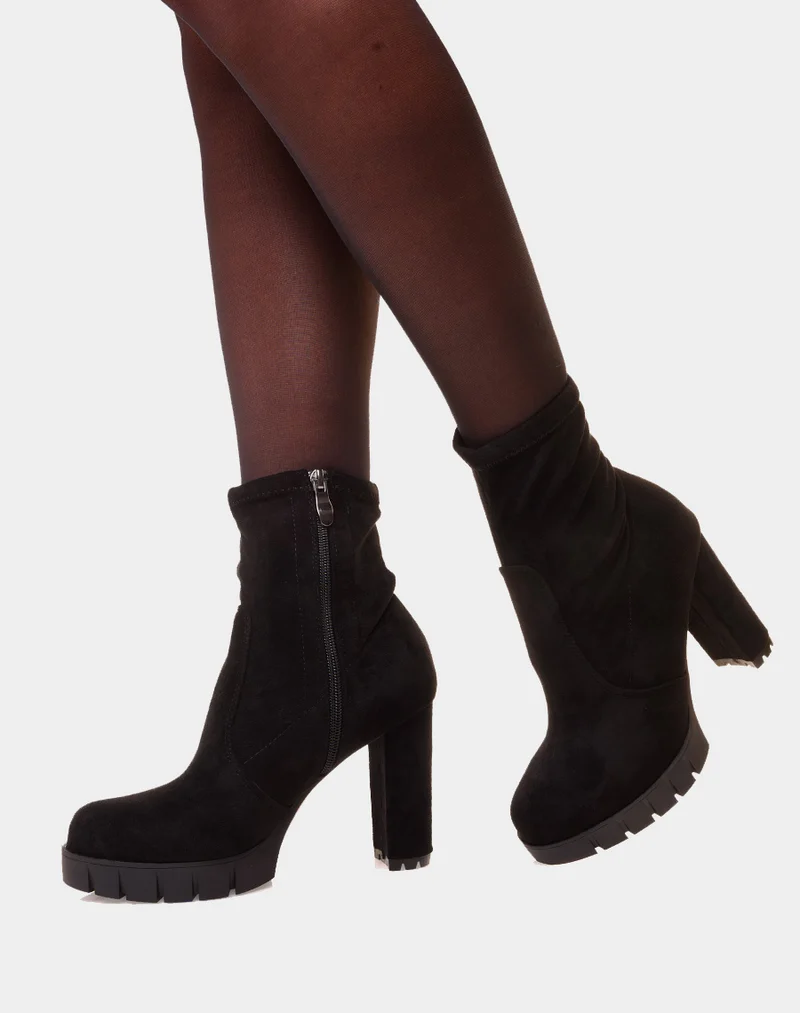 Bottines noires à talon en suédine à plateforme épaisse