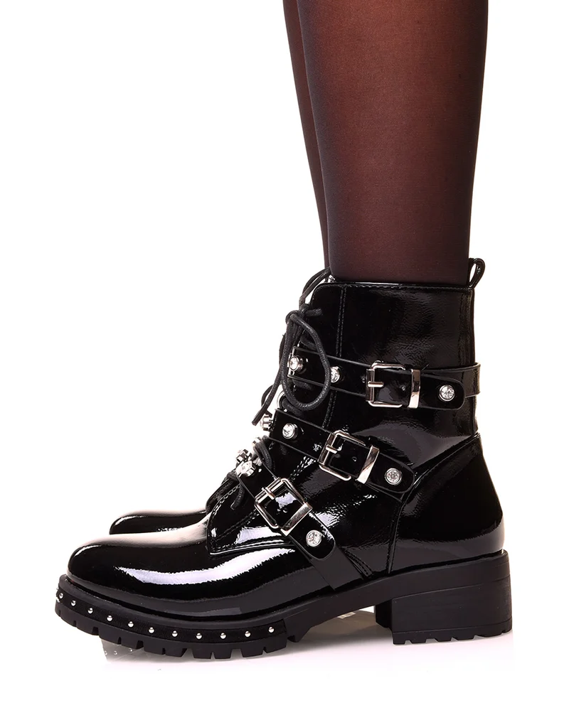 Bottines montante vernies noires à fermeture éclaire et sangles strassées