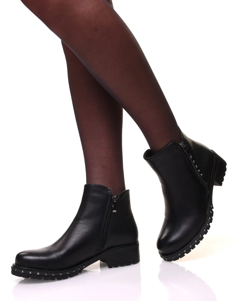 Bottines à fermetures éclaires décoratives et semelles cloutées
