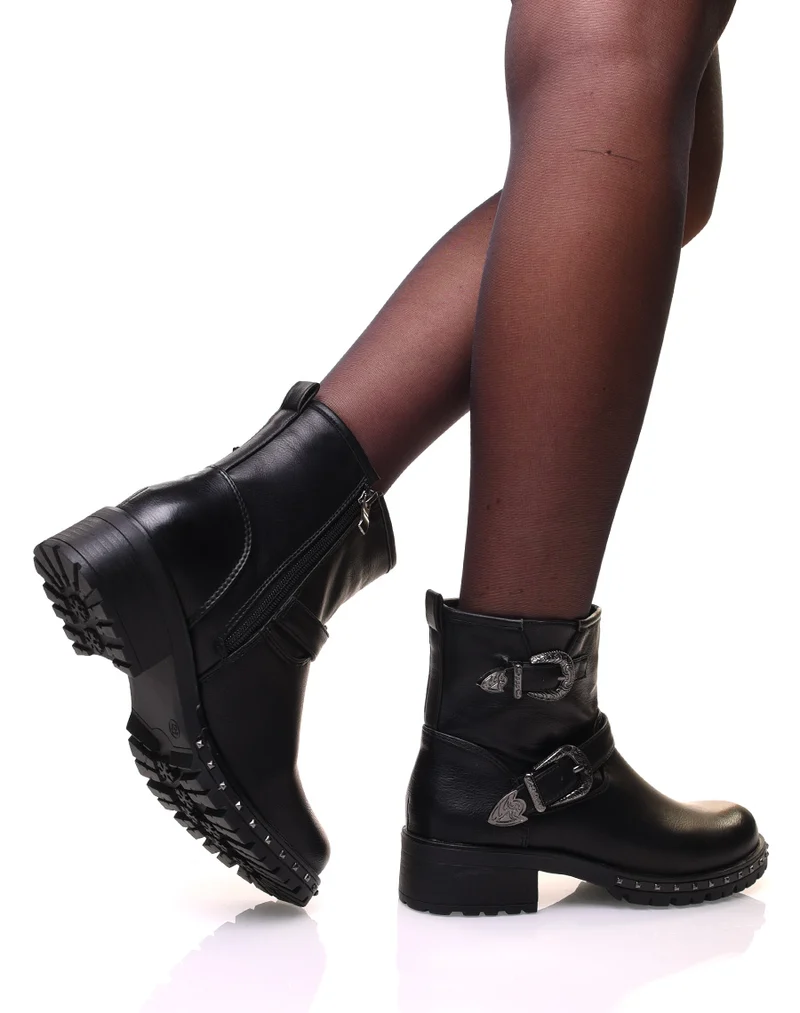 Bottines noires à sangles à boucles décorées