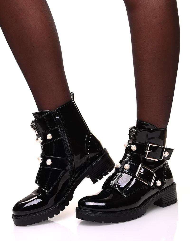 Bottines montantes vernies noires à fermeture éclaire et sangles perlées
