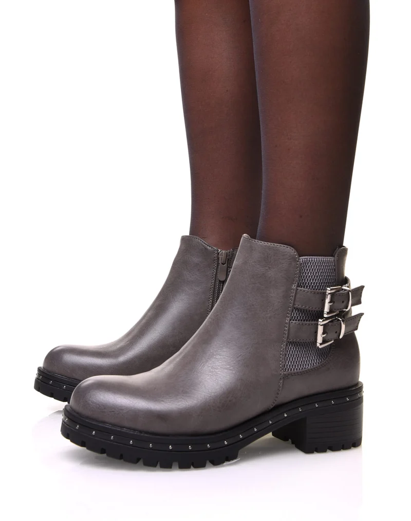 Bottines grises à semelle crantée et cloutée