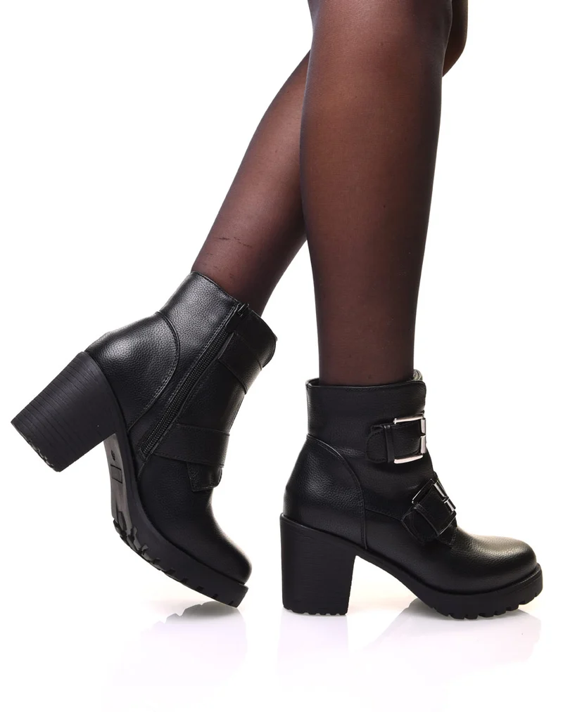 Bottines noires à talons et sangles
