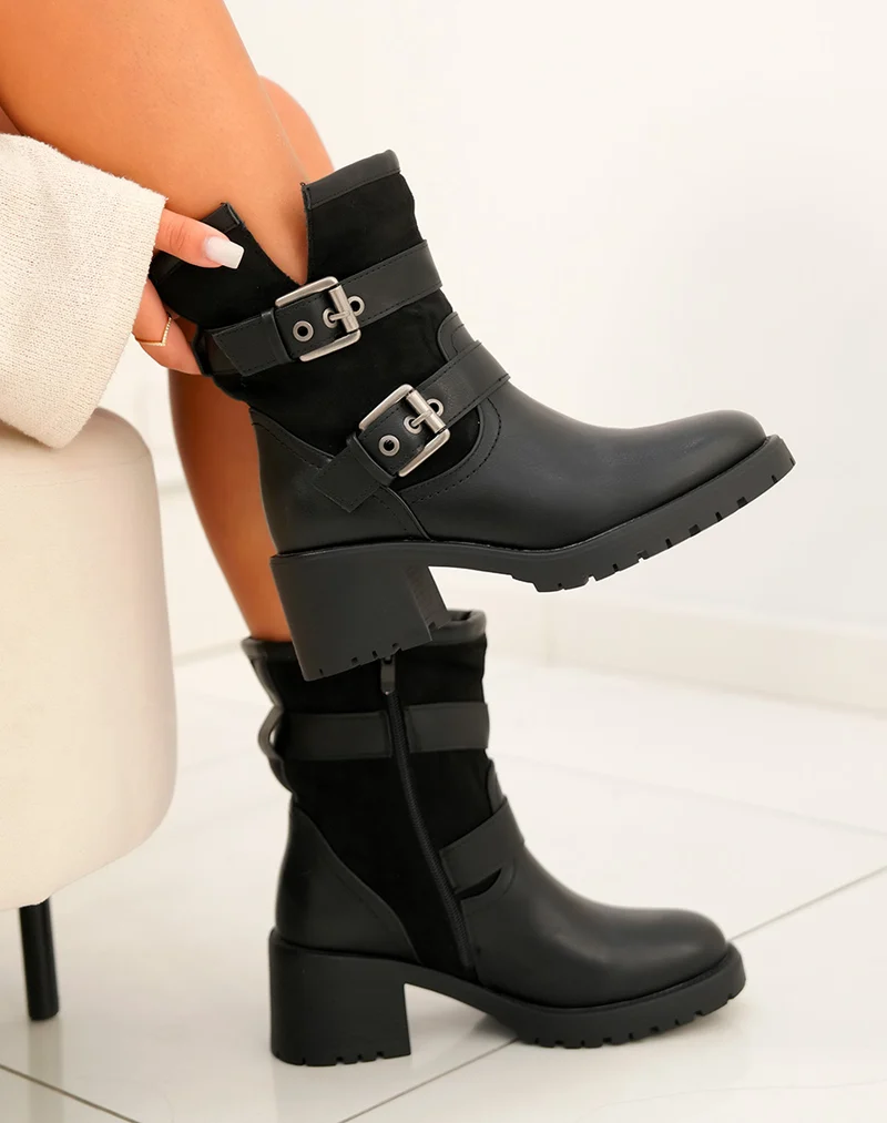 Bottines femme noires avec sangles et détails argentés semelle crantée