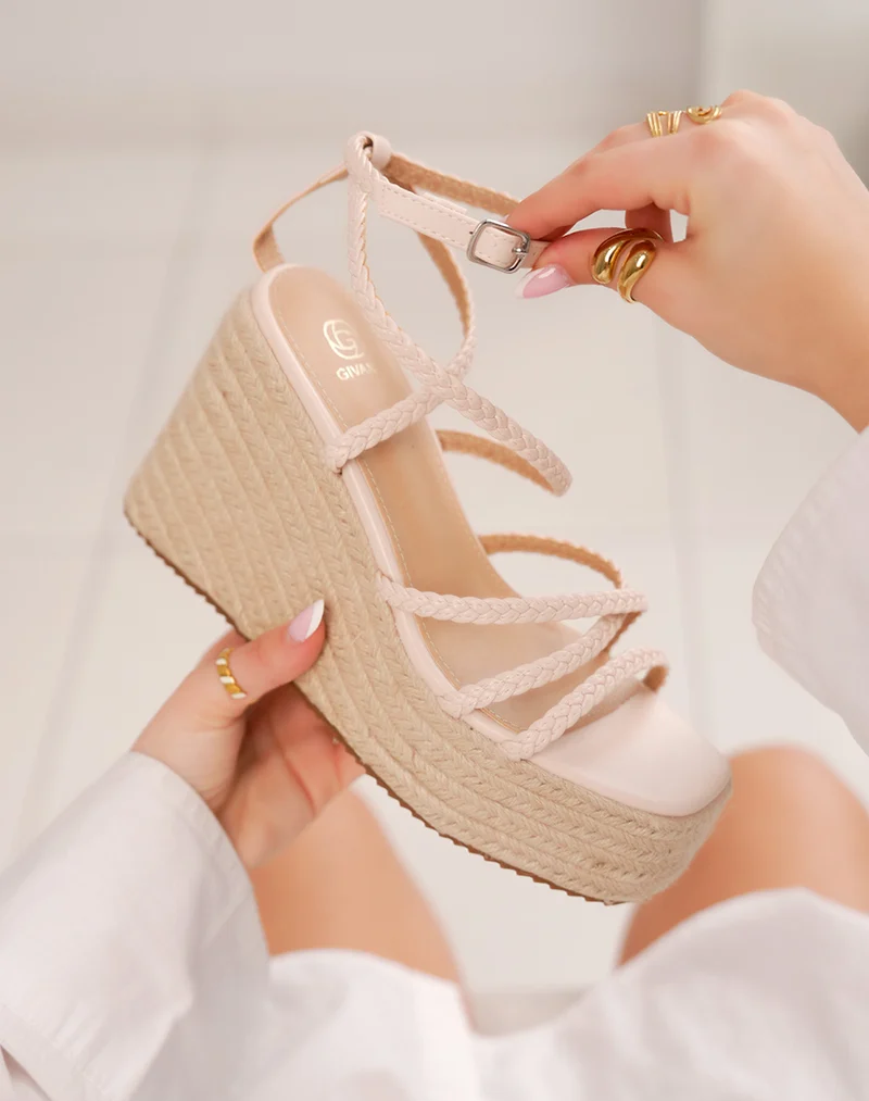 Sandales compensées femme beige avec lanières tressées et semelle effet corde
