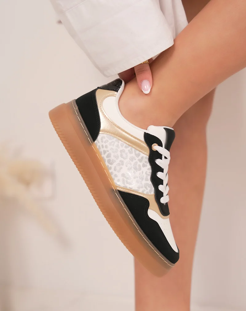 Baskets femme noires et blanches élégantes avec effet léopard argenté et détails dorés