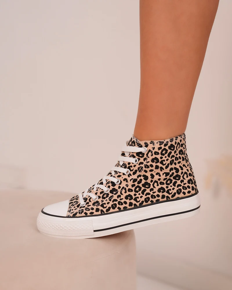 Basket femme montante léopard avec semelle blanche