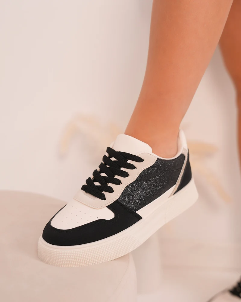 Basket femme blanche et noire avec détails léopard et paillettes