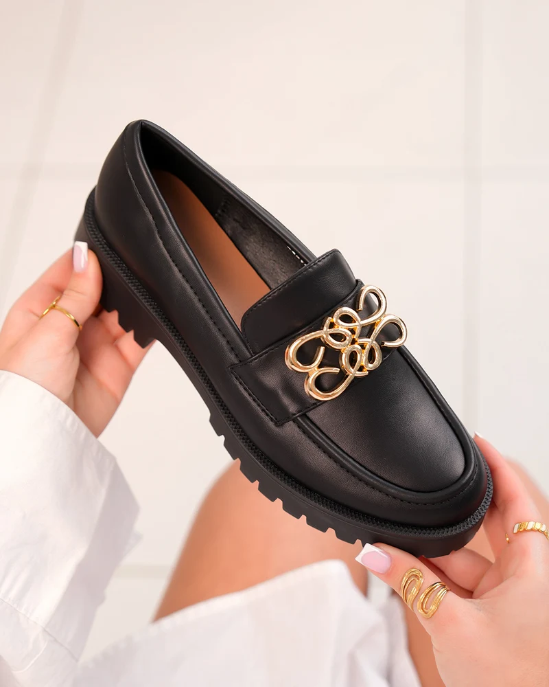 Mocassins femme noirs avec motif doré et semelle crantée