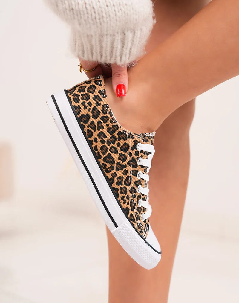Baskets femme basses tendance à imprimé léopard et semelle blanche