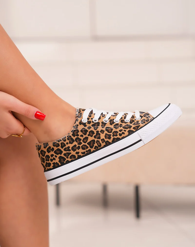 Baskets femme basses tendance à imprimé léopard et semelle blanche