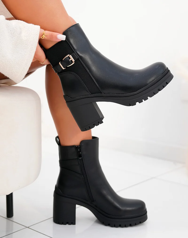 Bottines femme noires à talon avec lanière dorée et semelle crantée