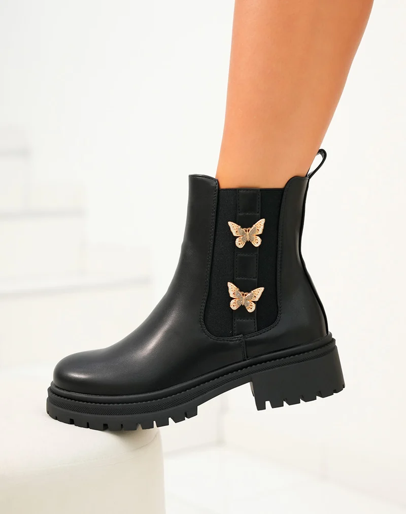 Bottines femme noires avec papillons dorés et semelle crantée