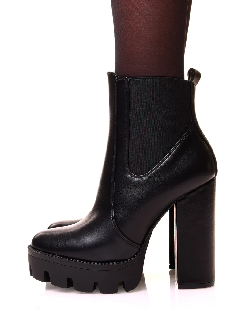 Bottines noires à talons et plateformes crantées