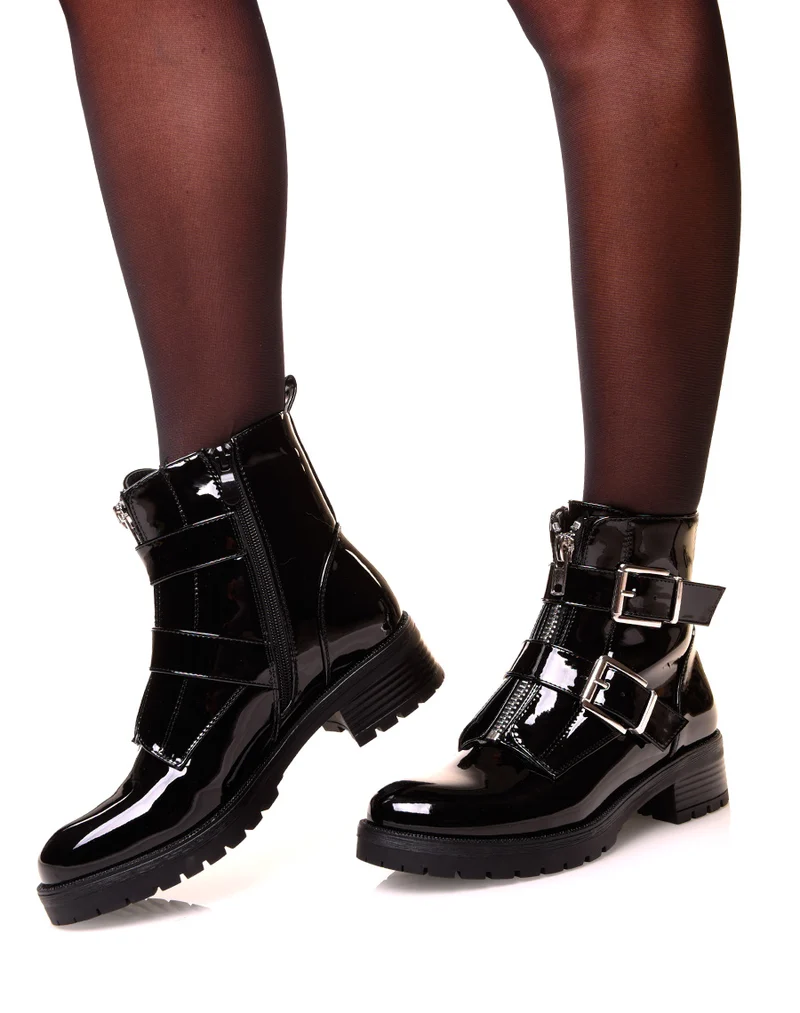 Boots noirs effet vernis à sangles