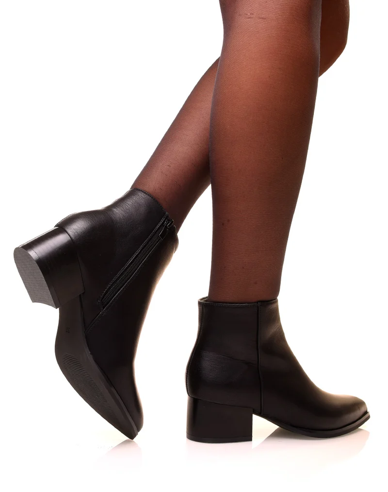 Bottines noires à talons carré et bouts pointus